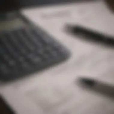 A close-up of a financial calculator and paperwork related to home loans.