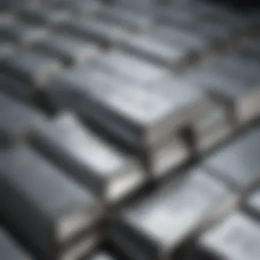 Silver bullion bars stacked with a reflective surface